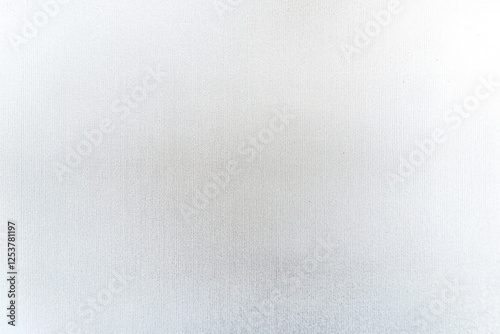 Textured metallic surface, brushed aluminum, matte finish, soft lighting, minimalist background, subtle gradients, industrial aesthetic, close-up detail, abstract texture, silvery gray tones, smooth 