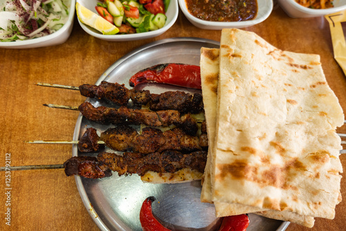 Ciger Kebabi served in restaurant Diyarbakir. traditional dish from Diyabakir, Turkish.  photo