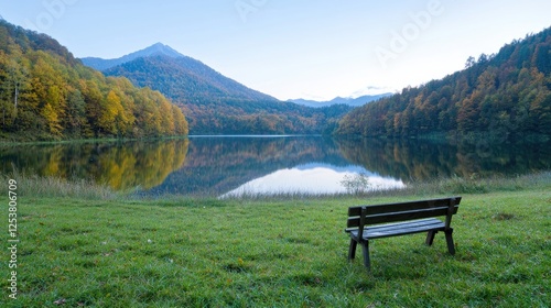 Autumn lake with wooden bench, tranquil scene, perfect for relaxation, scenic views