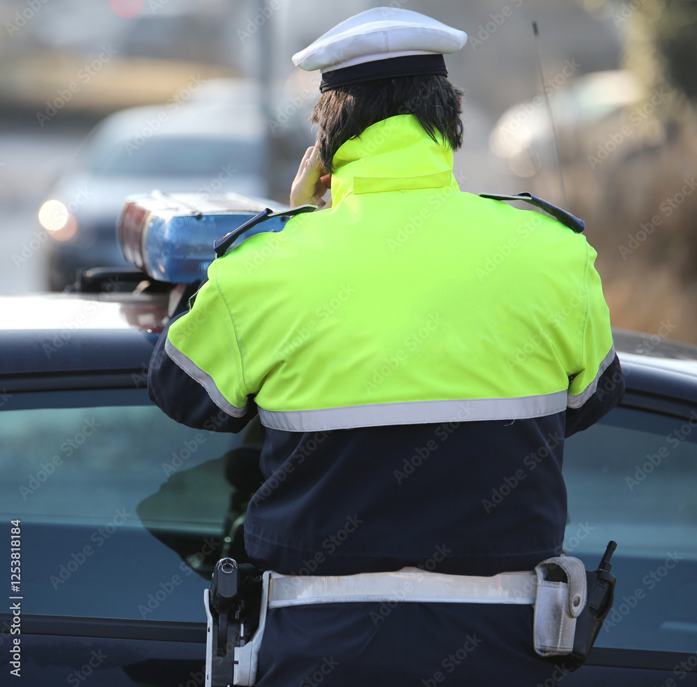Φωτογραφία Italian policeman with the  text POLIZIA LOCALE that means local police in Itali