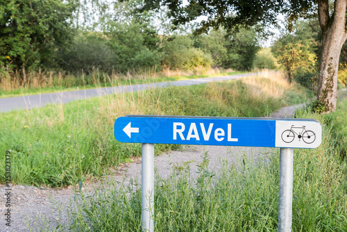 Blue Sign of the RAVeL, a bicycle trail on an old railwaytrack in a nature park