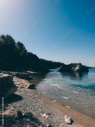 Fototapeta Naklejka Na Ścianę i Meble -  Sandstone rocks and pebble cove beach of Delikli Bay beach near Kerpe, Kocaeli Turkiye