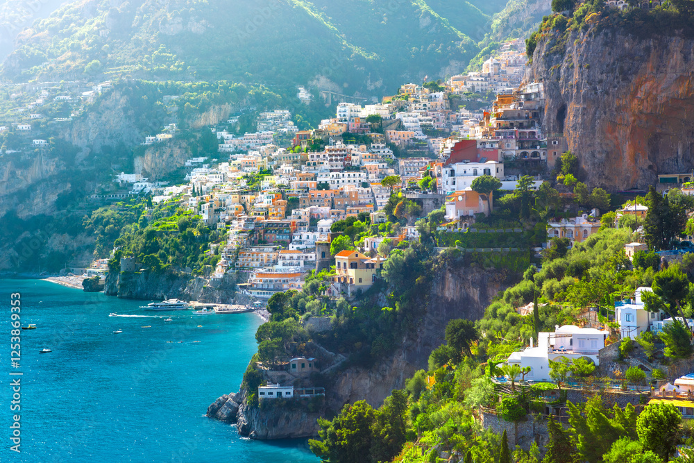 Morning view of Positano cityscape on coast line of mediterranean sea, Italy