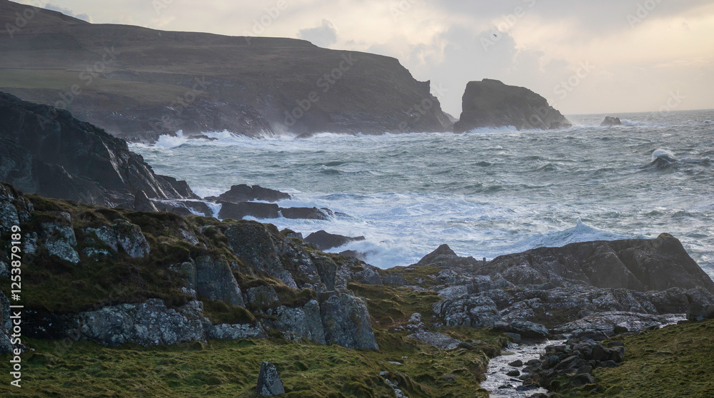 Waves crash against the cliffs in west Cork, Ireland Waves crash against the cliffs in west Cork, Ireland