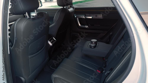 Wallpaper Mural view of the rear black color leather seats of the SUV no people.  Torontodigital.ca