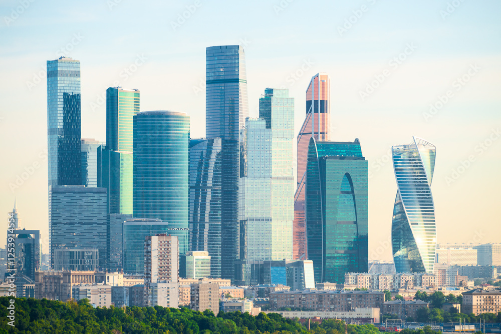 Typical residential development of the city of Moscow against the background of the tall business towers of Moscow City skyscrapers. Russia