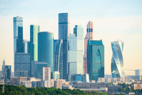 Obraz na płótnie Typical residential development of the city of Moscow against the background of the tall business towers of Moscow City skyscrapers. Russia w salonie