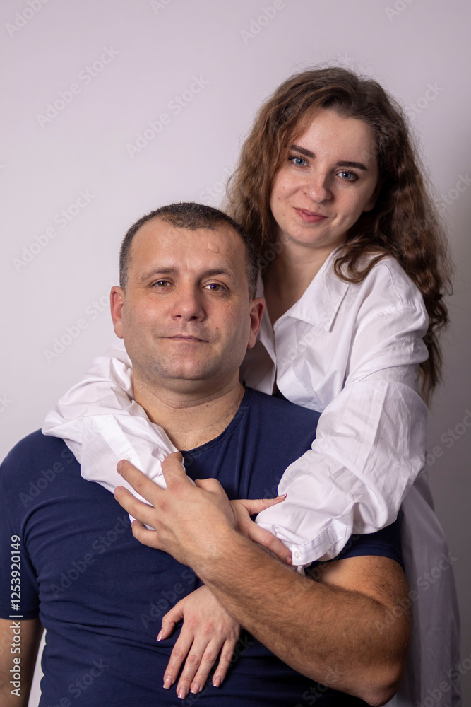 Couple hugging each other, demonstrating their love and strong bond Couple hugging each other, demonstrating their love and strong bond
