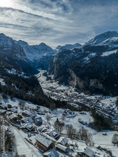 Lauterbrunnen Valley and Snowy Mountains on Sunny Winter Day. Swiss Alps. Switzerland. Aerial View. View from Wengen