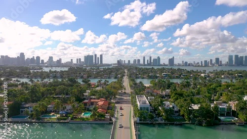 MIAMI, UNITED STATES - FEBRUARY 8, 2025: Aerial view of Miami skyline and lush neighborhoods under a clear sky