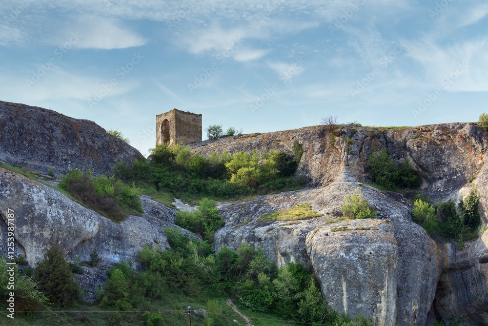 Fototapeta premium Small stony bower on rock near ancient cave settlement Eski-Kermen (Crimea, Ukraine).