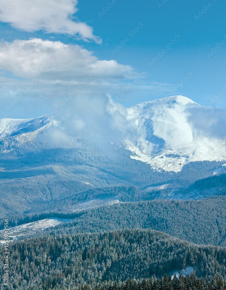 Morning cloudy winter mountain landscape. View from Kukol Mount. (Carpathian Mountains, Ukraine)