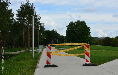 Stop sign in new city park footpath. Do not enter sign on new pathway. photo