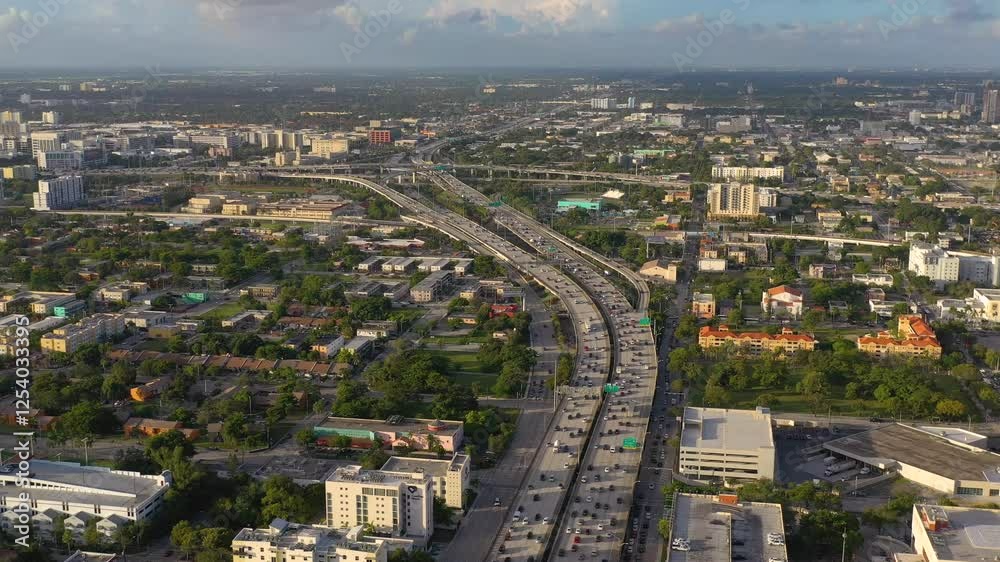 MIAMI, UNITED STATES - FEBRUARY 8, 2025: Aerial view of bustling highways and cityscape in Miami during the day MIAMI, UNITED STATES - FEBRUARY 8, 2025: Aerial view of bustling highways and cityscape in Miami during the day