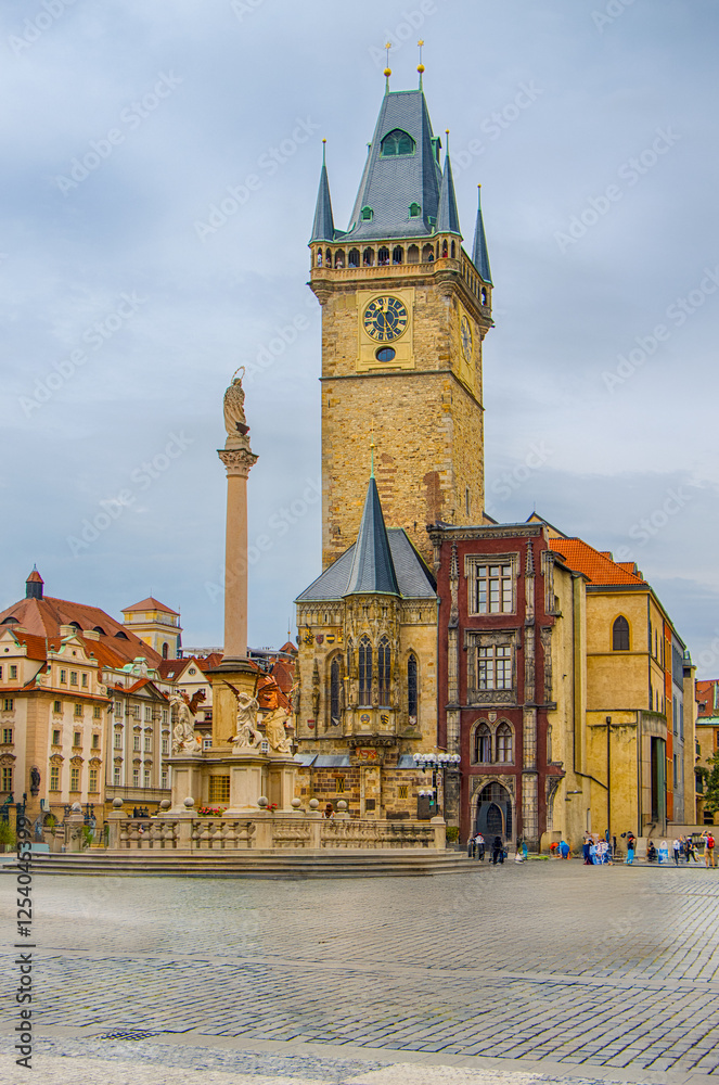 Fototapeta premium Prague, Prague, Czech Republic. Historic Marian Column with baroque statues and Gothic tower.