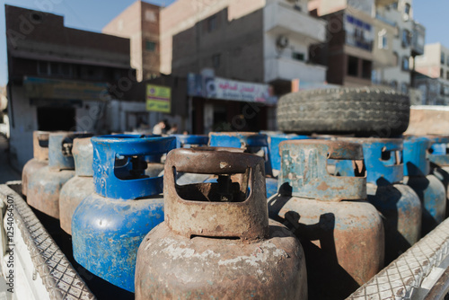 Gas transportation in cylinders. Energy. Truck distributing gas around the city. photo