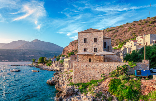 The waterfront of Limeni, with old traditional stonehouses that now serve as hotels and restaurants. Limeni is a small village on the Mani peninsula in the Peloponnese of mainland Greece.