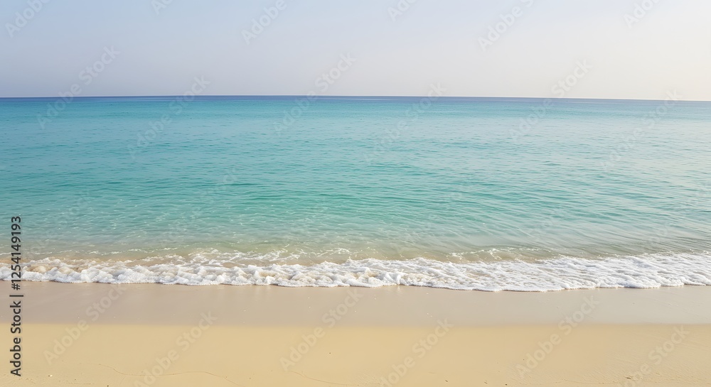 Calm Turquoise Ocean Water Meeting Sandy Beach on a Bright Day Calm Turquoise Ocean Water Meeting Sandy Beach on a Bright Day