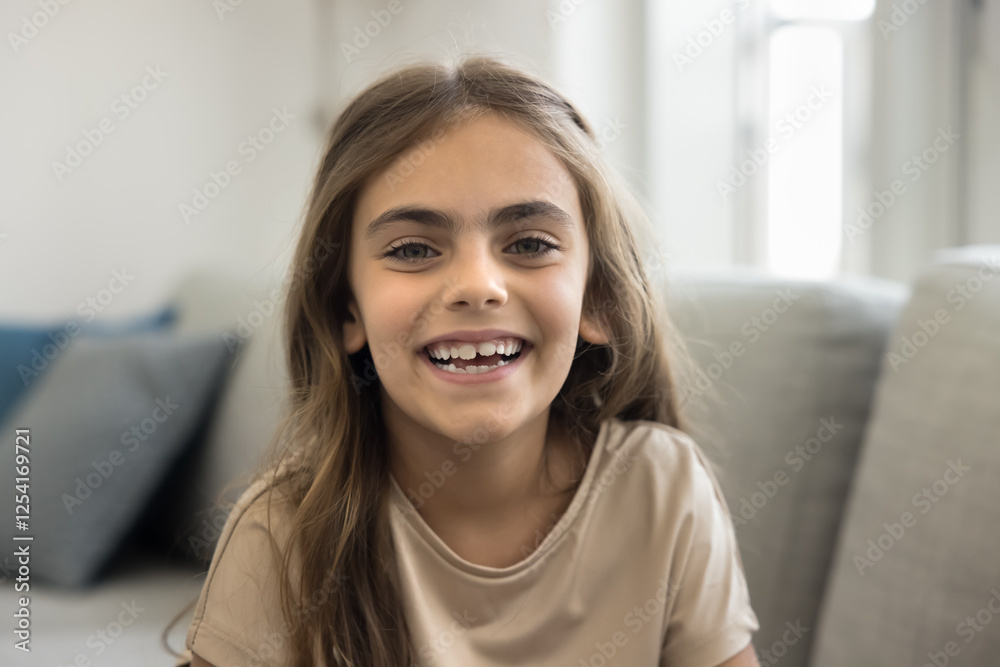 Head shot portrait laughing beautiful little 6s girl, smile, revealing teeth, looking at camera, advertising professional orthodontics and dental clinic services for kids. Happy carefree childhood Head shot portrait laughing beautiful little 6s girl, smile, revealing teeth, looking at camera, advertising professional orthodontics and dental clinic services for kids. Happy carefree childhood