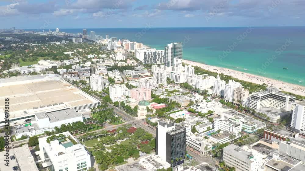 MIAMI, UNITED STATES - FEBRUARY 8, 2025: Stunning aerial view of Miami coastline with vibrant cityscape and beautiful beach scene MIAMI, UNITED STATES - FEBRUARY 8, 2025: Stunning aerial view of Miami coastline with vibrant cityscape and beautiful beach scene