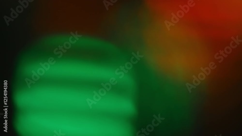 4k light leak real in camera effect red and green Christmas lens flare film burn overlay background transition.
