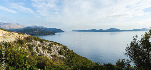 Picturesque view of the islands of Croatia, with cliffs in the foreground. Good sunny weather. Panorama