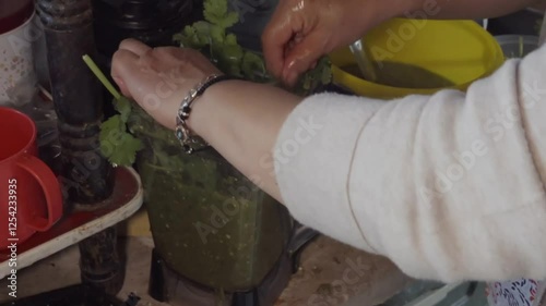 Discover the traditional methods for making Mexican tamales with green salsa and chicken