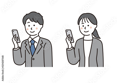 スマホを見るビジネスパーソン
