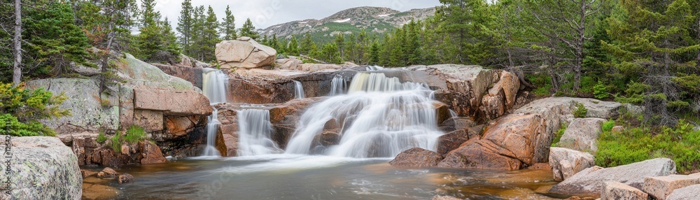 Cascading Waterfall in Rocky Landscape Cascading Waterfall in Rocky Landscape