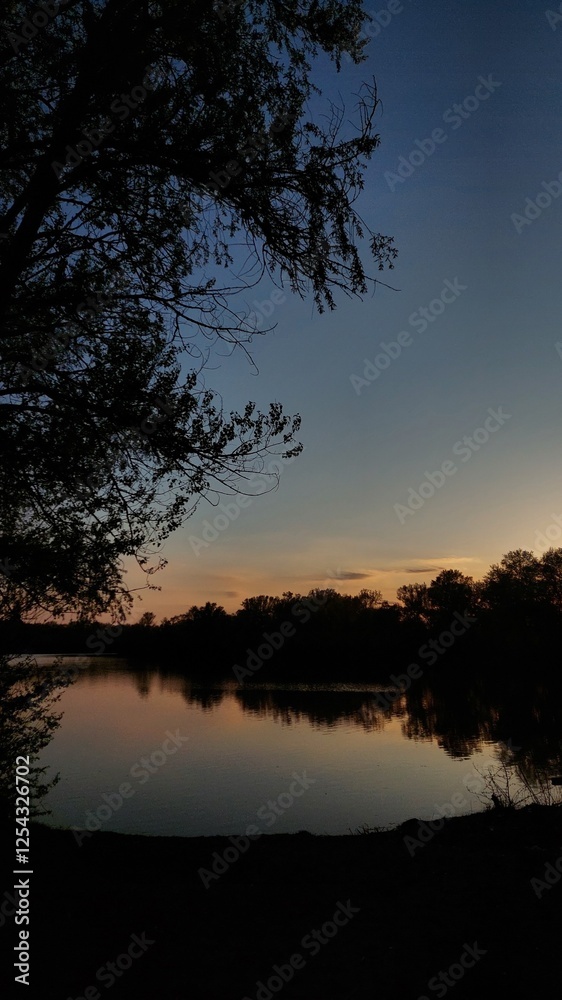 Fototapeta premium sunset over the river