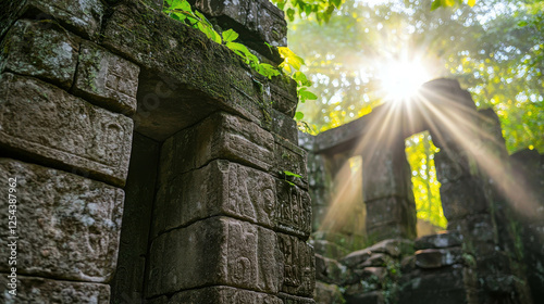 Ancient Temple Ruins Partially Hidden by Thick Jungle with Sunlight Streaming Through photo