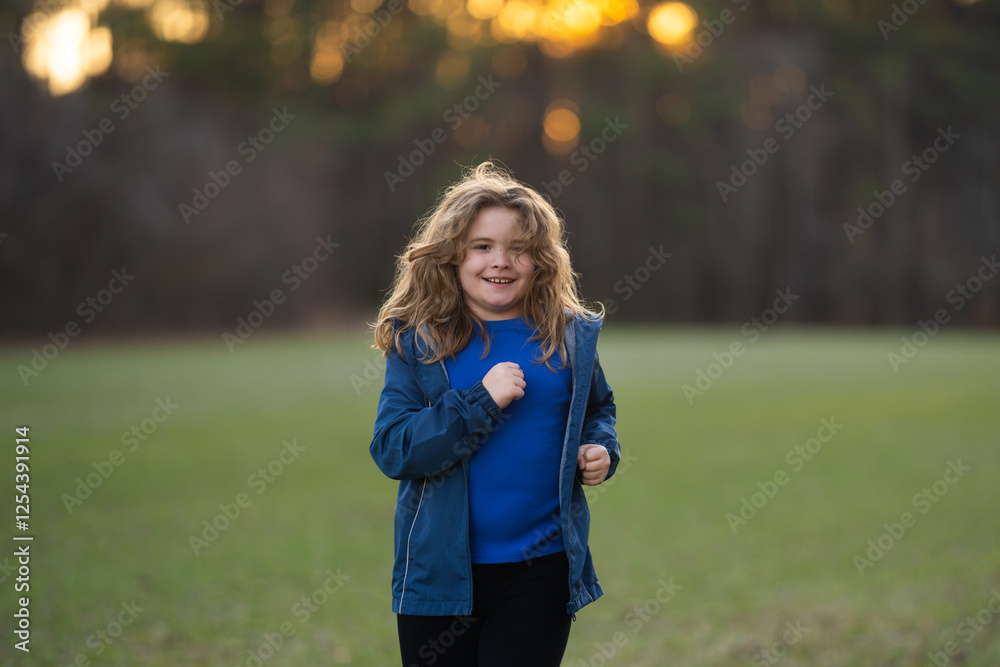 Kid boy in motion, full of energy. Running kids playing in the sunshine. Joyful runner enjoying outdoor exercise. Little jogger the fun of running. Child racing through a grassy field. Kid boy in motion, full of energy. Running kids playing in the sunshine. Joyful runner enjoying outdoor exercise. Little jogger the fun of running. Child racing through a grassy field.