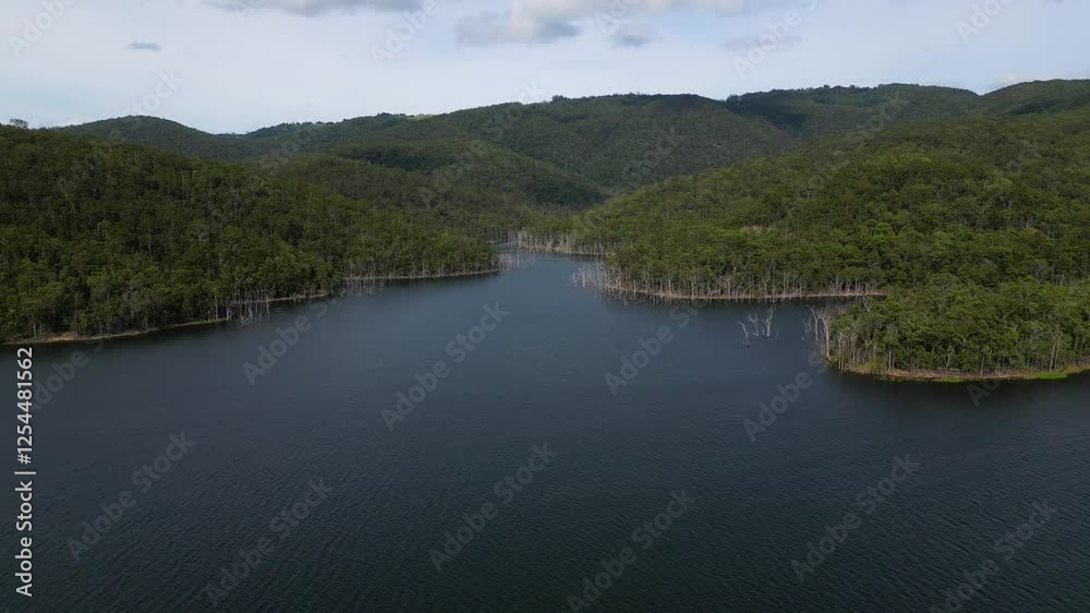 Rising aerial views of Advancetown Lake near the Western Boat Ramp on the Gold Coast Hinterland. Rising aerial views of Advancetown Lake near the Western Boat Ramp on the Gold Coast Hinterland.