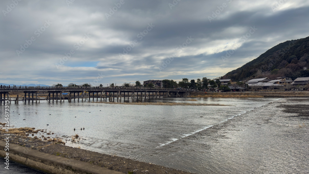 Scenic View of Arashiyama River from Togetsukyo Bridge Kyoto Japan Nature Landscape Serene Environment Panoramic Perspective Scenic View of Arashiyama River from Togetsukyo Bridge Kyoto Japan Nature Landscape Serene Environment Panoramic Perspective