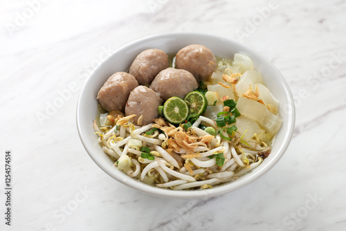 Mie Kocok Baso Bandung. Traditional Sundanese Dish of Beef Noodle Soup with Meatball and Bean Sprout photo