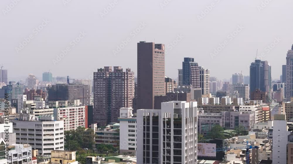 Fly sideways with view of various buildings in Kaohsiung City, Taiwan Fly sideways with view of various buildings in Kaohsiung City, Taiwan