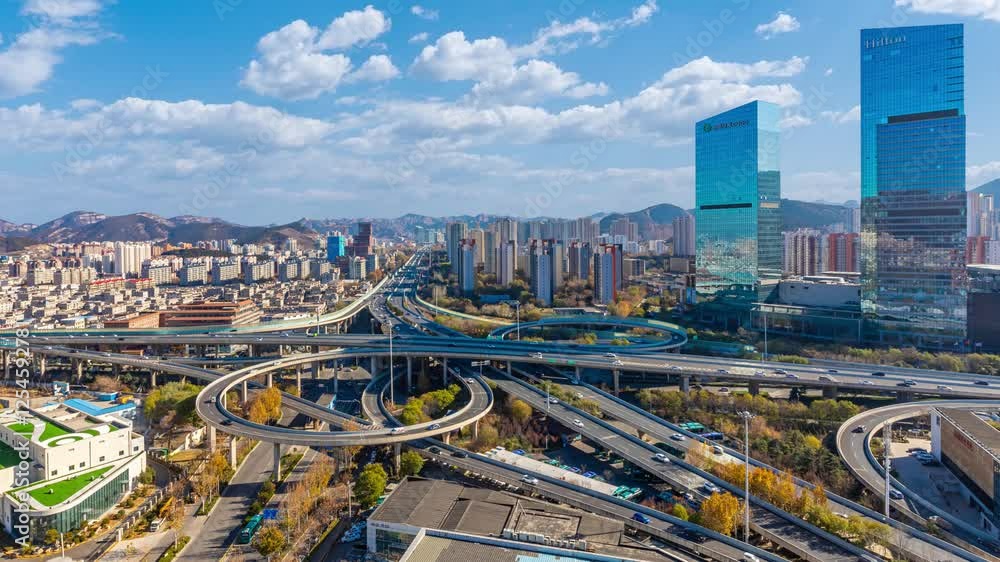 4k aerial video of Jinan hero mountain overpass with traffic delay observations in daytime 4k aerial video of Jinan hero mountain overpass with traffic delay observations in daytime
