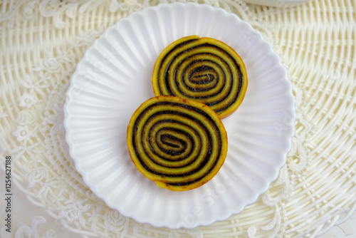 Lapis Legit Gulung is Indonesian Traditional Thousand Layered Cake Roll. photo