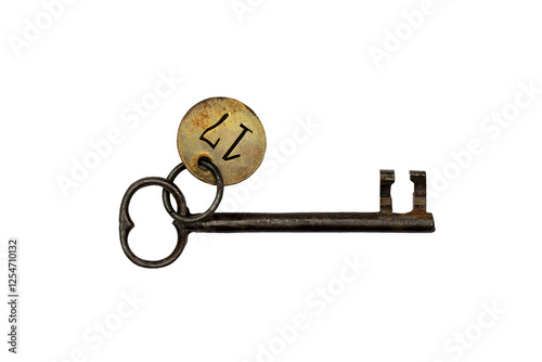 isolated ancient key, with metal pendant and the number 17