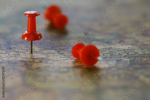 Fotografi ** Red Push Pins on a World Map Indicating Travel Destinations or Important Loca