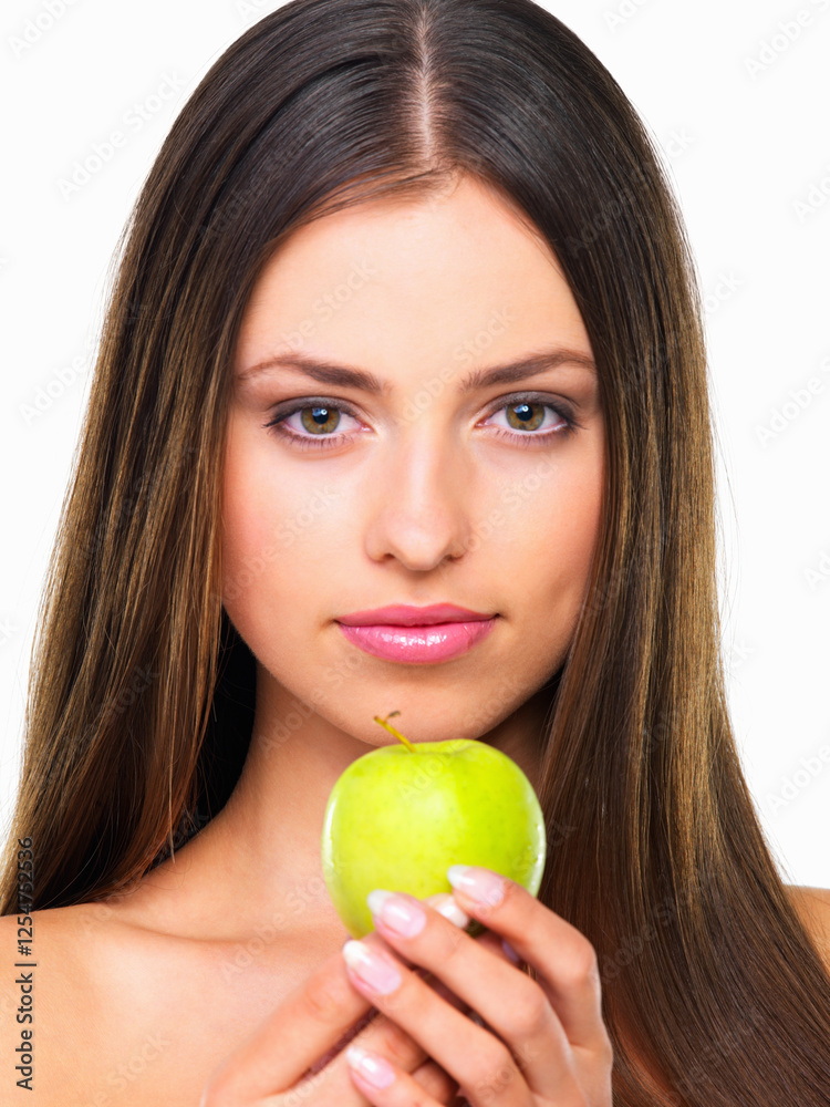 Woman, apple and beauty in studio, portrait and choice for health benefits with pride by white background. Girl, model and person with organic fruit, cosmetics or makeup with vegan nutrition in Italy Woman, apple and beauty in studio, portrait and choice for health benefits with pride by white background. Girl, model and person with organic fruit, cosmetics or makeup with vegan nutrition in Italy