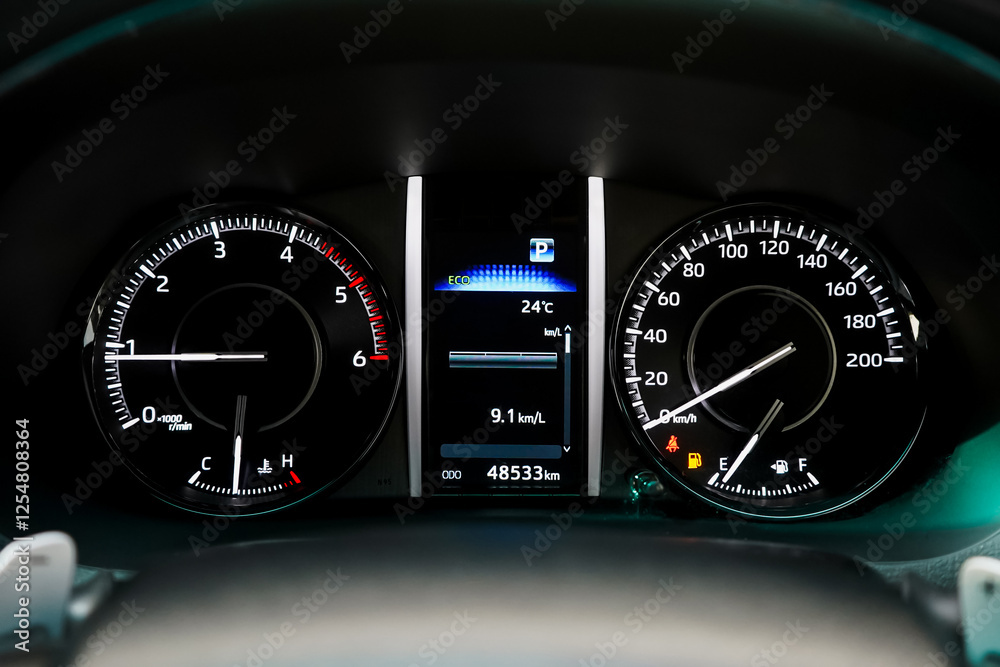 Fototapeta premium car​ instrument panel, car​ speed motor of​ night, car​ dashboard​ modern​ automobile control​illuminated panel​ speed display.