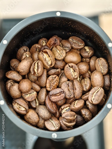 A heap of coffee beans stacked together, ready to be brewed into a delicious cup of coffee.