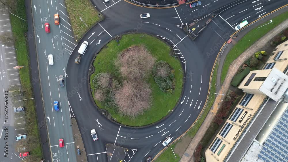 view from above of a traffic roundabout at rush hour. Located in Huddersfield in West Yorkshire