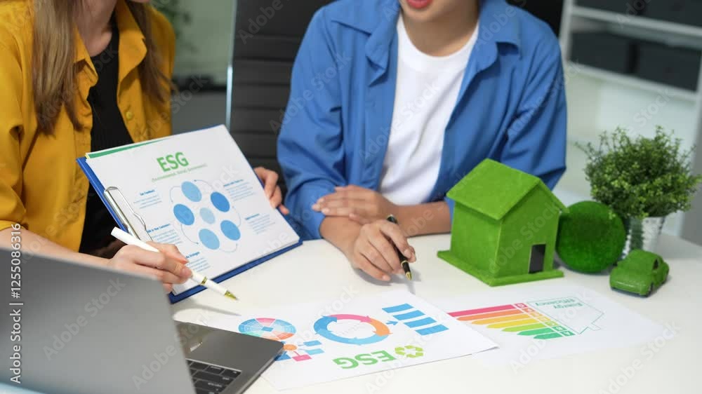 Engineer Teamwork Meeting, with partner on model building at company office working technology, Renewable energy-based green businesses and global warming.