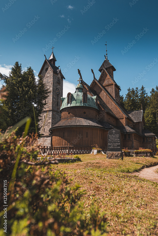 Fototapeta premium Wang Church is a historic church located in the town of Karpacz, Poland. It is one of the most popular tourist attractions in the area and is known for its unique Scandinavian architecture.