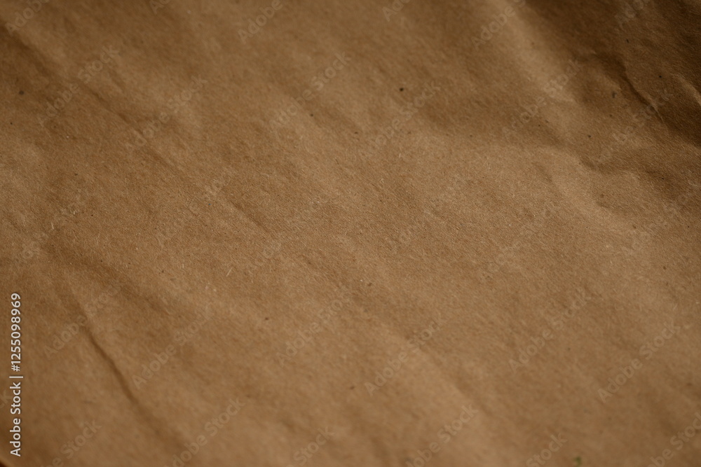 light brown crumpled paper texture as background, old kraft paper as background, crumpled packing material texture as background photo above light brown crumpled paper texture as background, old kraft paper as background, crumpled packing material texture as background photo above