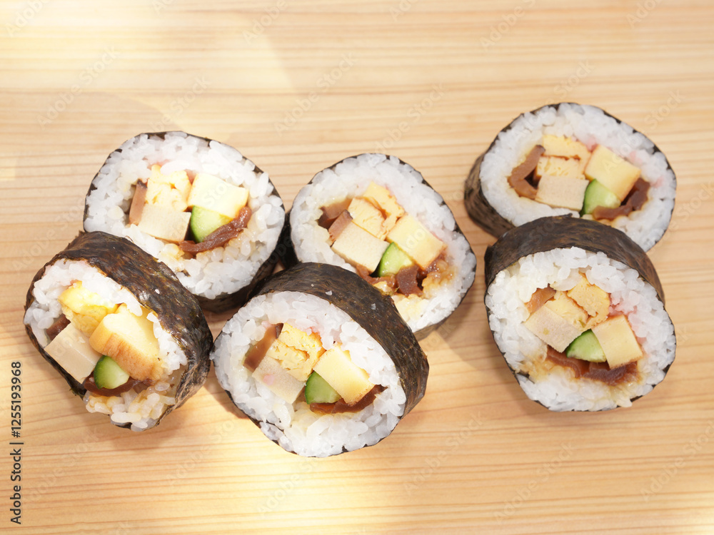 Homemade sushi roll on wood board. Japanese food. Homemade sushi roll on wood board. Japanese food.
