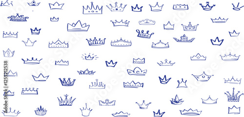 Hand drawn doodle set of grunge crayon, charcoal, chalk crown isolated icon