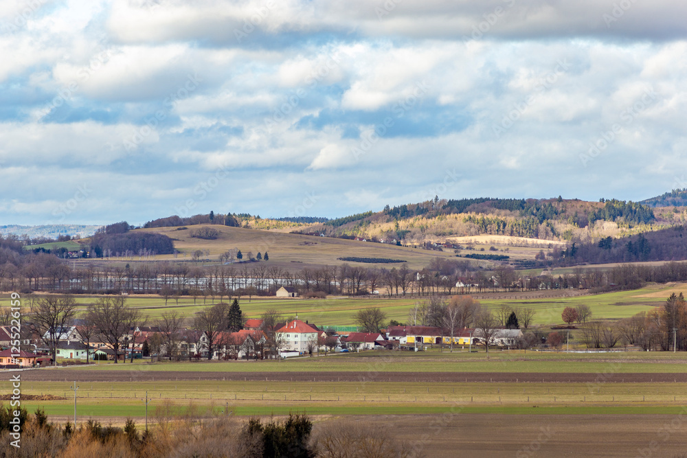 A rural landscape with villages and fields in early spring. South Bohemia, Czechia A rural landscape with villages and fields in early spring. South Bohemia, Czechia